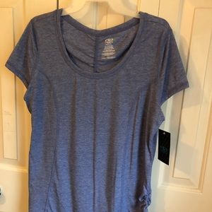 Athletic works moisture wicking top. High low hem.